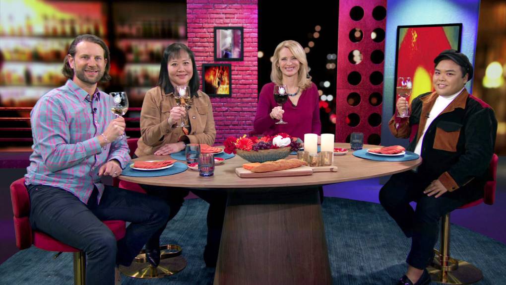 Three Bay Area residents join host Leslie Sbrocco in lifting their wine glasses in a "cheers."