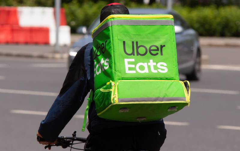 UberEats delivery person on a bike