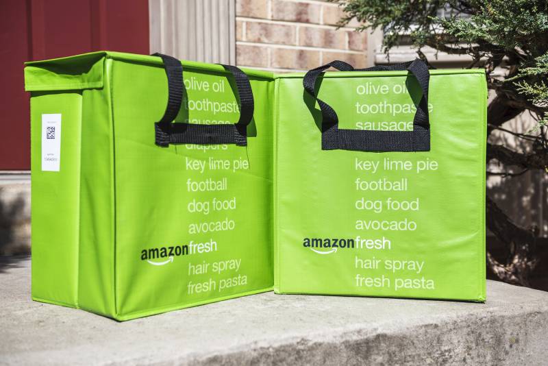 Amazon Fresh insulated grocery delivery bags on front porch closeup