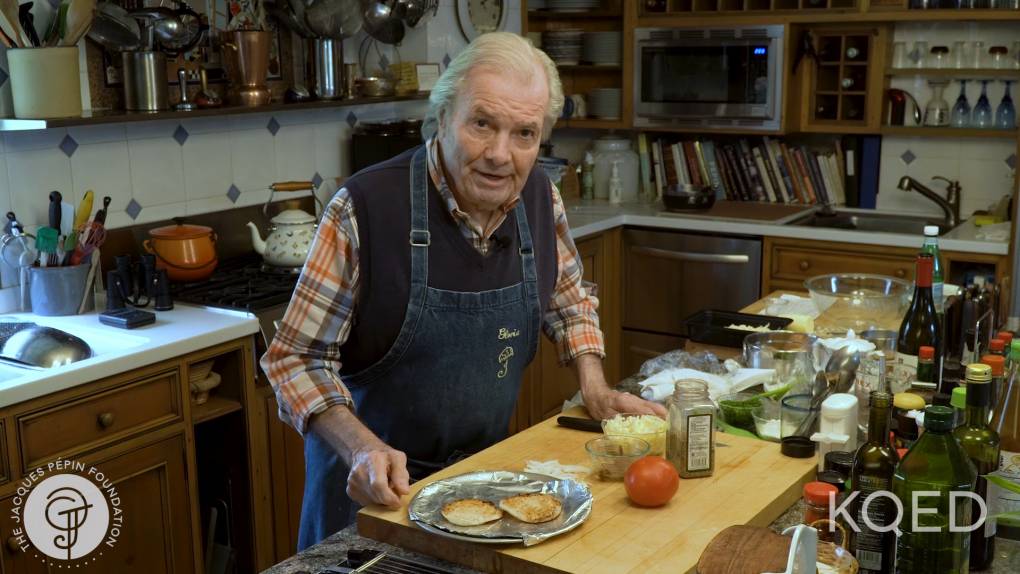 jacques pepin in his kitchen with sandwich prep