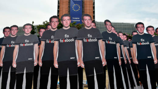 Global activists of Avaaz, set up cardboard cutouts of Facebook chief Mark Zuckerberg, on which is written 'Fix Fakebook', in front of the European Union headquarters in Brussels, on May 22, 2018, as they call attention to what the groups says are hundreds of millions of fake accounts still spreading disinformation on Facebook.