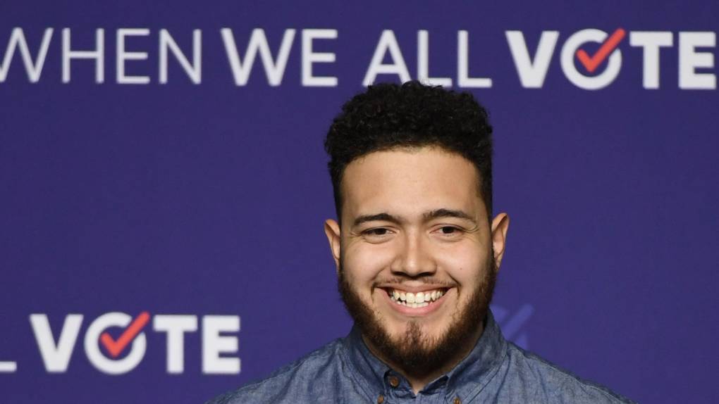 Youth organizer Aaron Ibarra speaks before introducing former first lady Michelle Obama at a rally for When We All Vote's National Week of Action at Chaparral High School on September 23, 2018 in Las Vegas, Nevada.