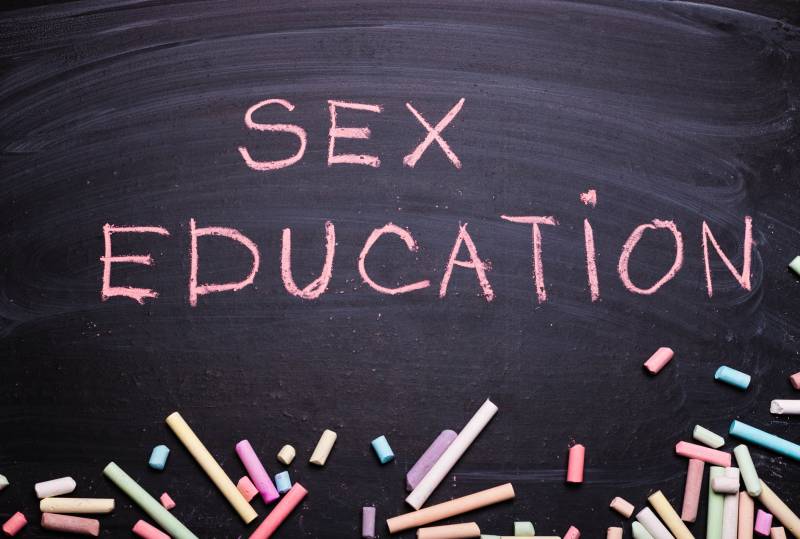 The word sex education written in chalk on a blackboard