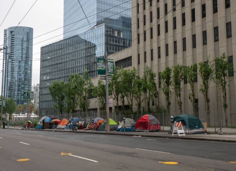 Tents line the sidewalk in San Francisco's financial district.
