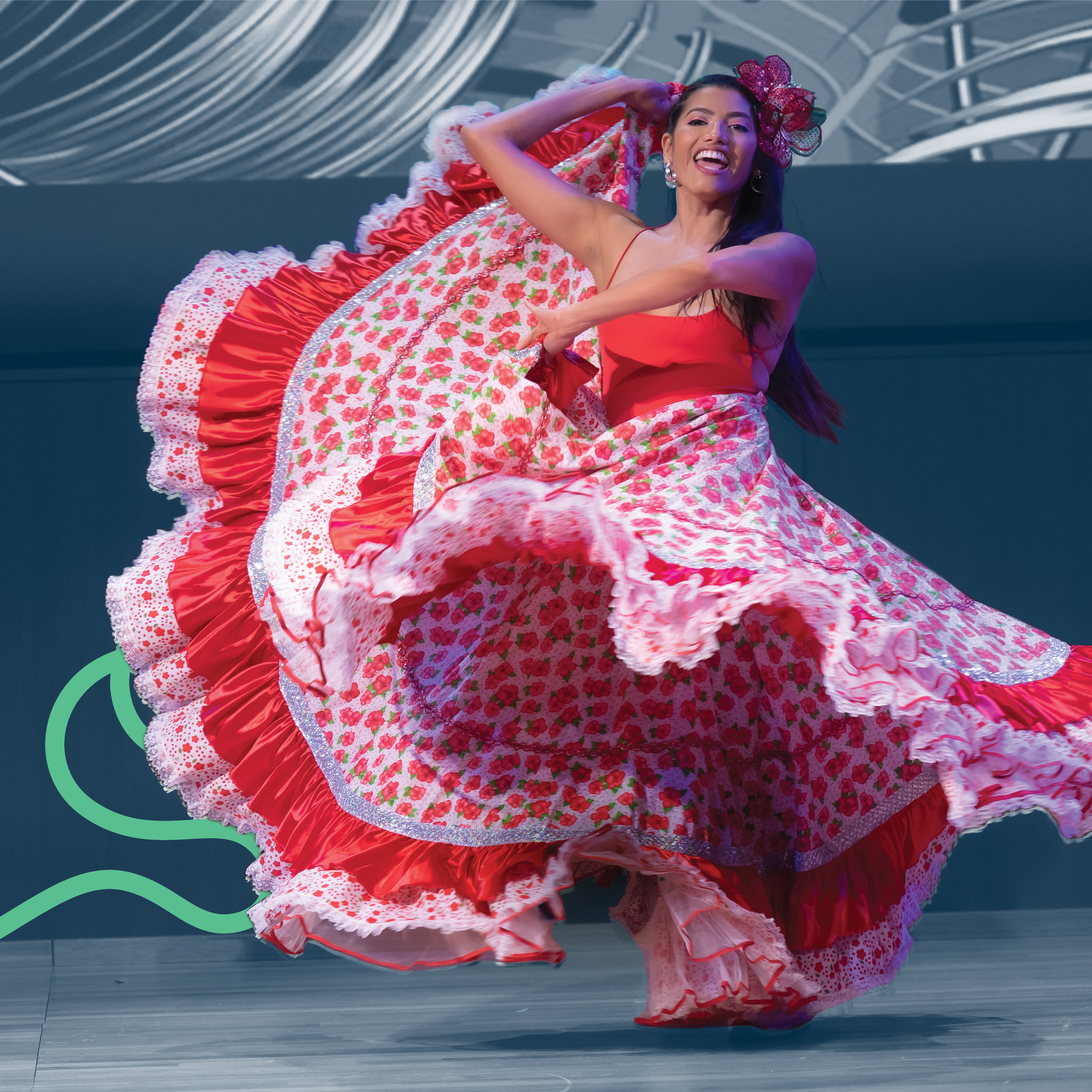A woman in a bright red dress dances and spins