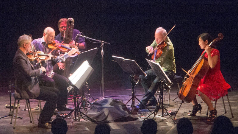 Ralph Carney (third from left) plays with the Kronos Quartet at the 2015 Cabrillo Festival of Contemporary Music in Santa Cruz