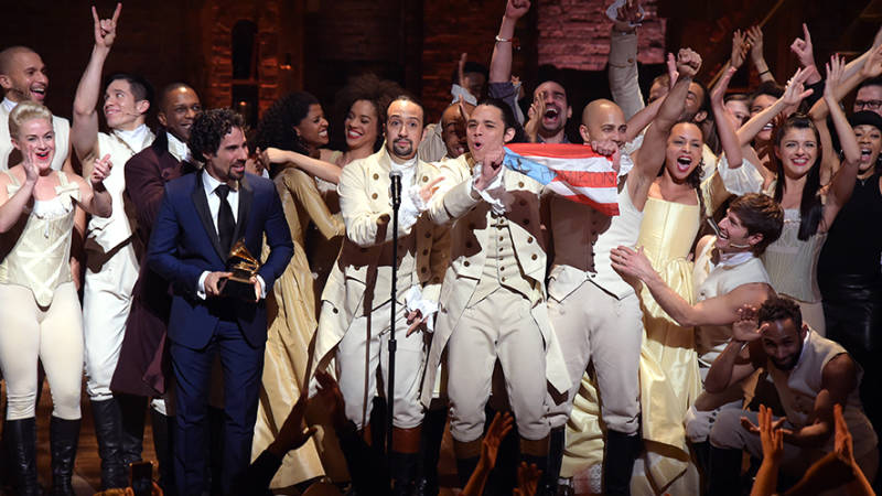 Music director Alex Lacamoire and Actor, composer Lin-Manuel Miranda celebrate on stage during 'Hamilton' GRAMMY performance