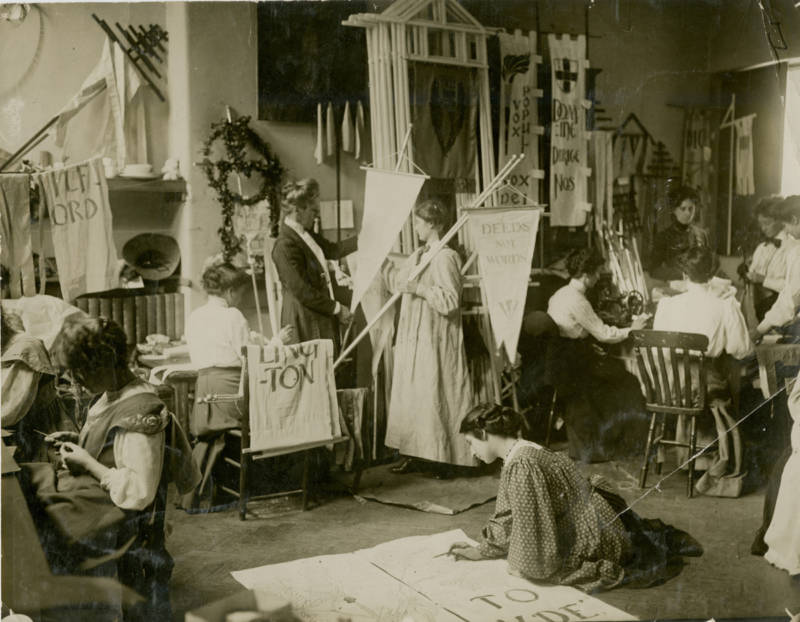 Making banners for a Women's Social & Political Union rally, 1910.