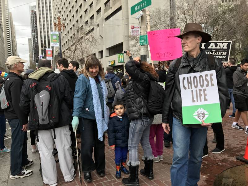 Anti-abortion marchers arrive at Justin Herman Plaza.