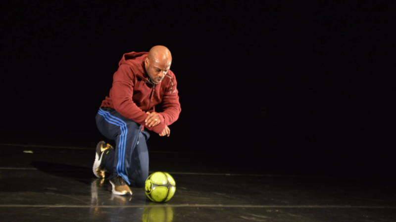 Marc Bamuthi Joseph dances with and then contemplates a soccer ball in his 'pen-LO-tah.'