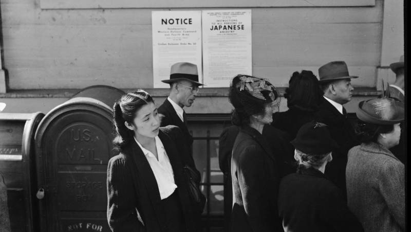 Shizuko Ina waits in line in San Francisco to hear news of her fate in the wake of President Franklin D. Roosevelt signing Executive Order 9066.