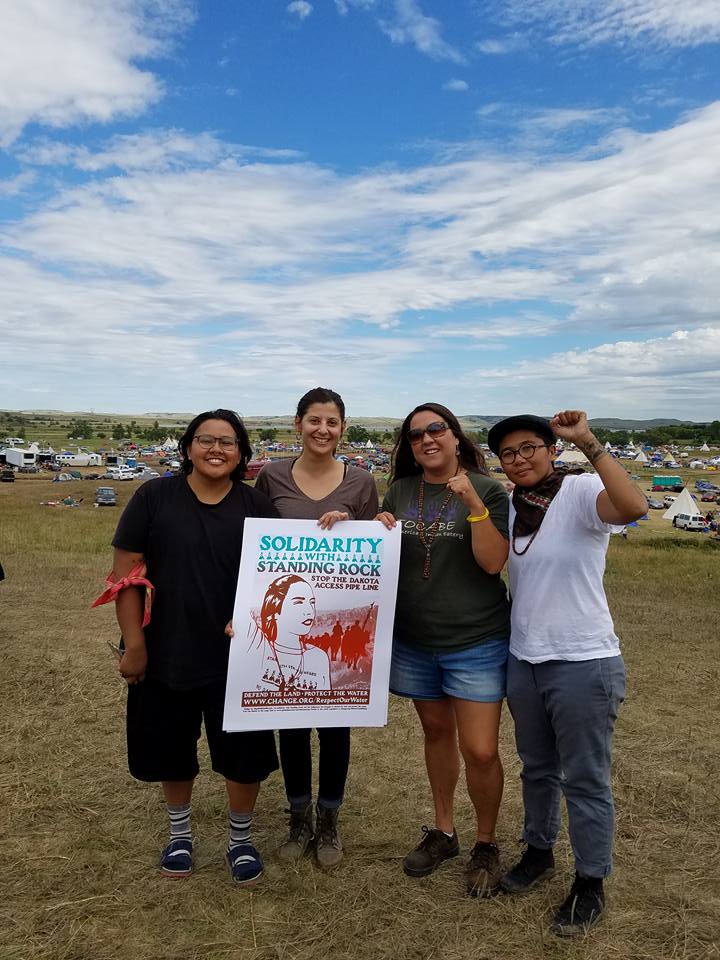 Protesters holding Jesus Barraza's 'Solidarity with Standing Rock,' 2016.