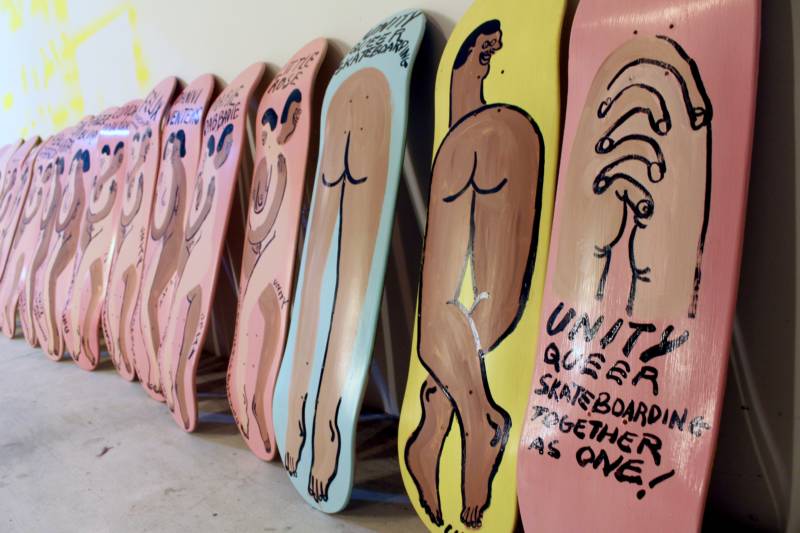 a collection of Jeffrey Cheung's hand-painted skateboard decks. 