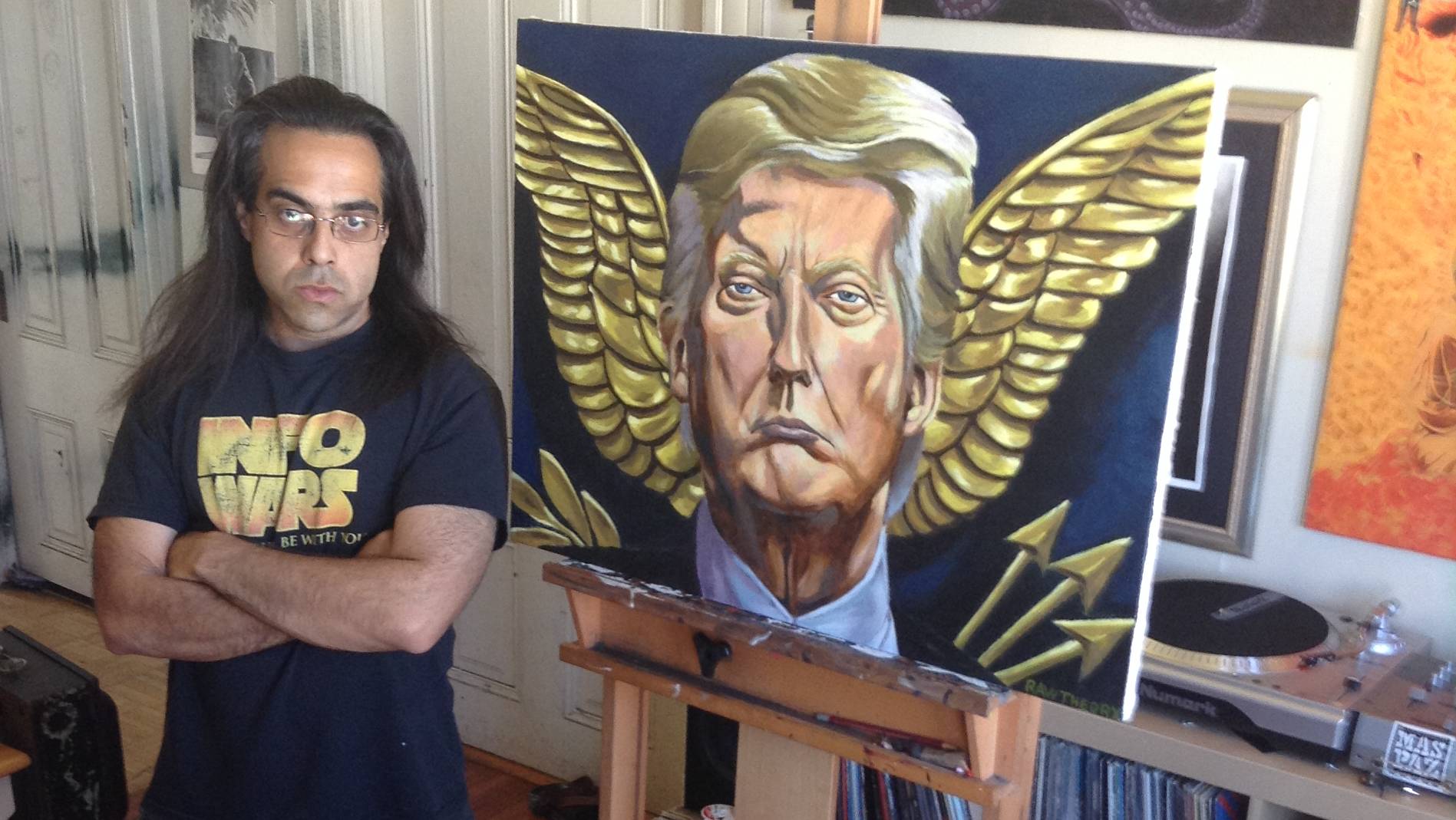 Oakland artist Jon Proby poses with his painting ‘POTUS and me’.