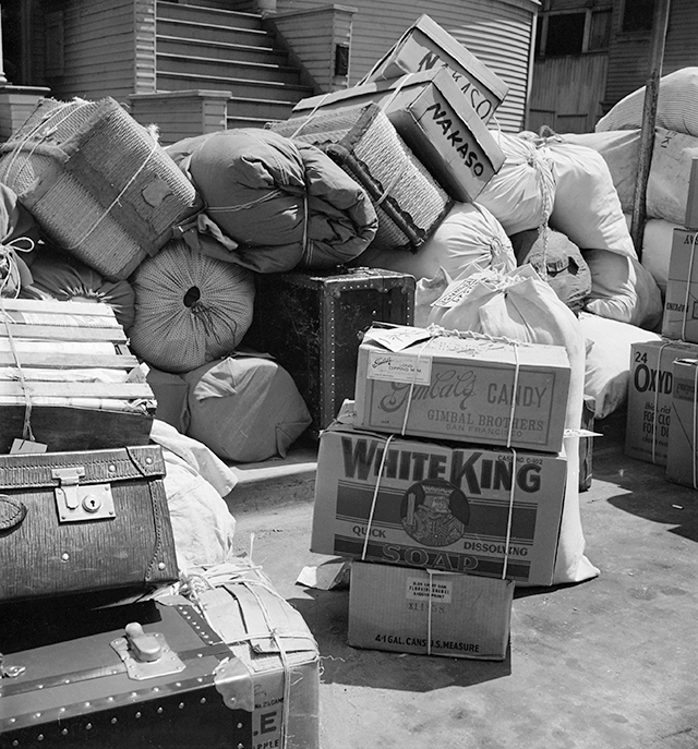Dorothea Lange, 'Oakland, Calif. (1117 Oak Street)--Baggage belonging to evacuees of Japanese ancestry, ready to be loaded into moving vans to be taken to Tanforan Assembly Center, May 6, 1942.'
