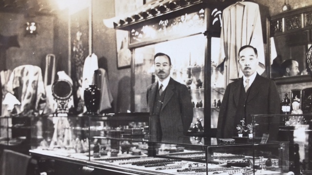 Hisao Magario (on the left) at one of the stores he once owned in the Bay Area.