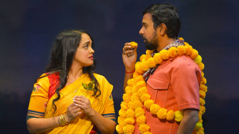 The Wedding Planner Dubey (Namit Das) and the woman of his dreams Alice (Anisha Naagarajan) in Mira Nair's musical theater adaption of her hit film, 'Monsoon Wedding' at the Berkeley Rep.