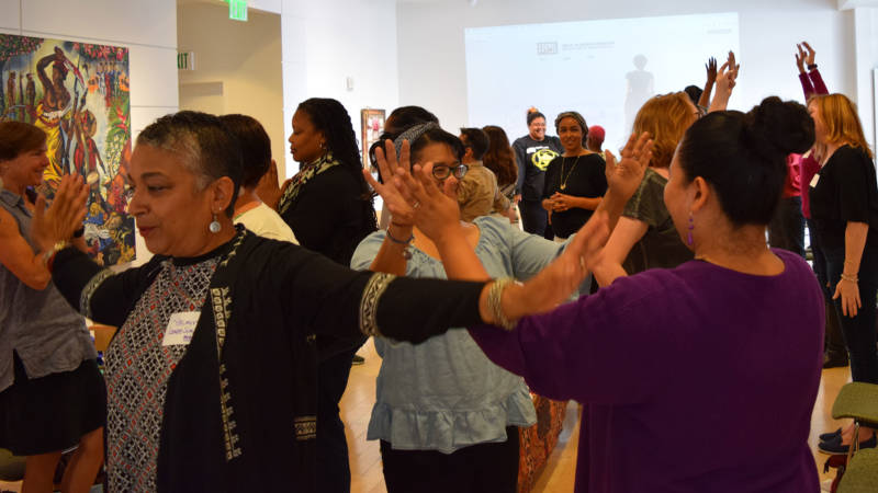 Participants in the Rise Up! workshop at the Museum of the African Diaspora run an exercise on June 24, 2017.