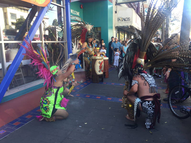 Dancers performing in front of the Mission Cultural Center for Latino Arts