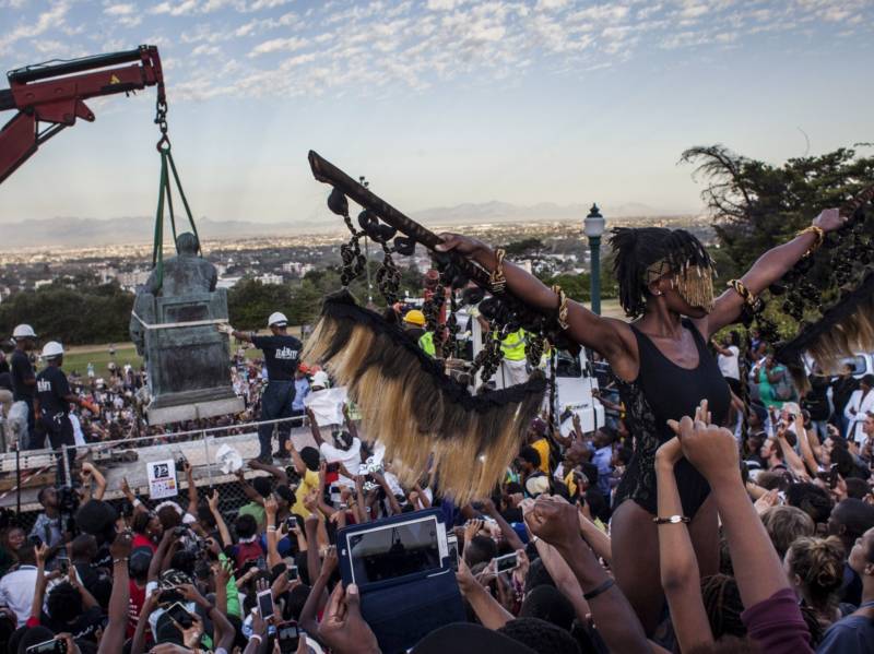 Students cheer as the Cecil Rhodes statue is removed from the University of Cape Town in South Africa in April 2015.