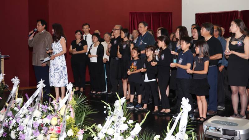Representatives of Ann Woo's two families, her personal family and that of Chinese Performing Arts of America, spoke and performed at her memorial.