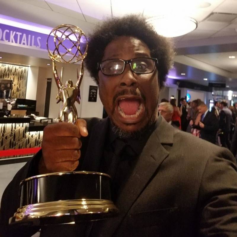 W. Kamau Bell with his Emmy