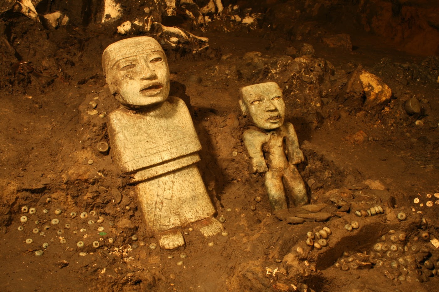 Detail of two standing anthropomorphic sculptures discovered near the terminus of the tunnel beneath the Ciudadela and the Feathered Serpent Pyramid. 
