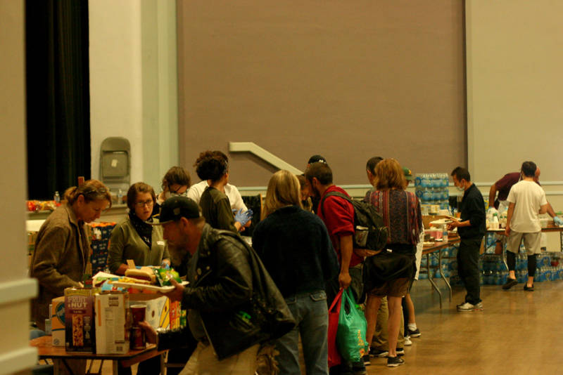 Salvation Army volunteers serving food to evacuees inside the Santa Rosa Veterans Memorial Building, Oct. 12, 2017.