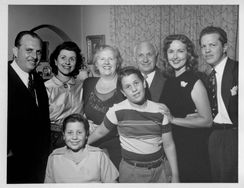 The Mills Family, left to right: Richard Mills, Beatrice Myrow, Fred Myrow, Bessie Mills, Jeff Myrow, Irving Mills, Anne Mills, Paul Mills