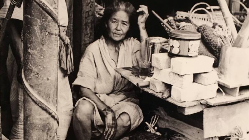 Detail of "Tattoos," by Charles Eugene Gail; c. 1952. "Notice tattoos on her wrist, an old marrying custom," Gail wrote on the back. Old indeed. Japan banned the practice of hachiji in the late 19th century as part of an effort to suppress local customs. Women like this one were some of the last to wear these indigo tattoos for decades. The practice is now enjoying a resurgence on Okinawa.