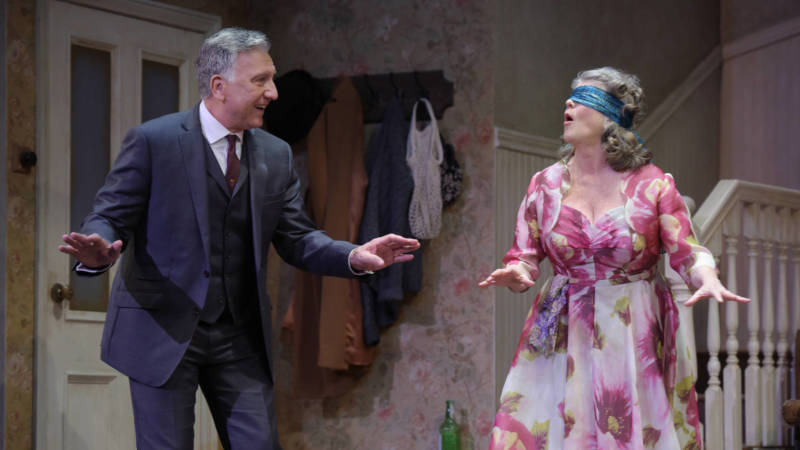 Goldberg (Scott Wentworth) dances around Peg (Judith Ivey) with the spirit of the devil in his eye during a game of Blind Man's Bluff in Harold Pinter's 'The Birthday Party' at ACT.