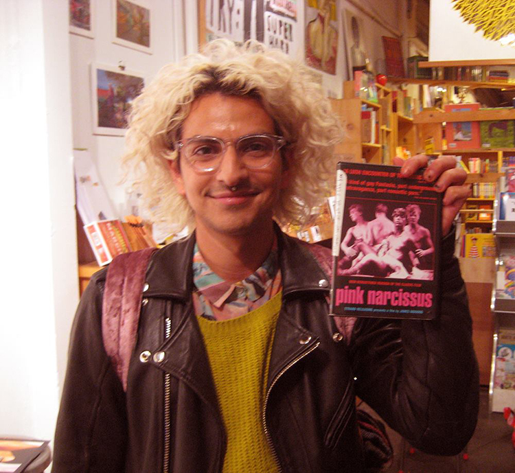 Film selector Jai Carillo holding his choice, James Bidgood's 1971 'Pink Narcissus.'