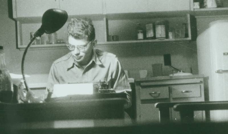 Allen Ginsberg at his typewriter, date unknown.