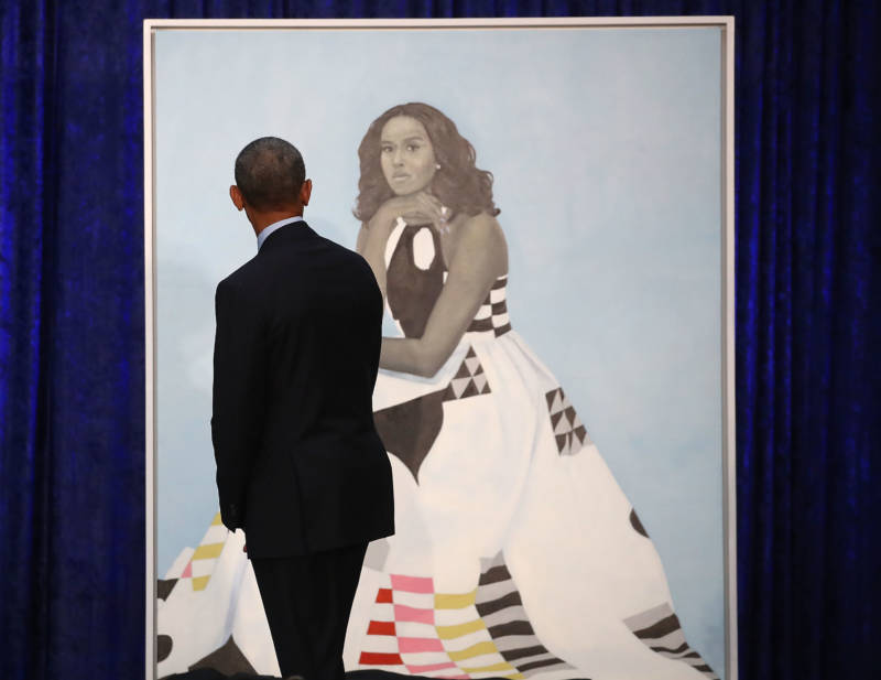 Former U.S. President Barack Obama looks at former first lady Michelle Obama's newly unveiled portrait during a ceremony at the Smithsonian's National Portrait Gallery.