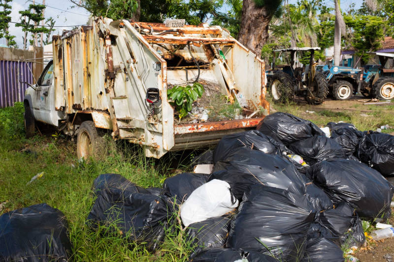 An immobilized garbage truck at a beachside resort in Punta Santiago, Puerto Rico. Tourism, an important sector in the Puerto Rican economy, has been slow to recover in the wake of Hurricane María.