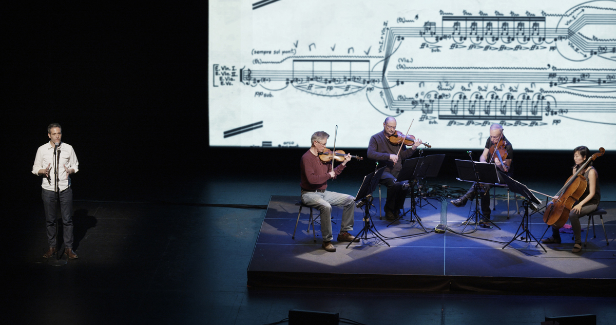 A scene from Sam Green and Joe Bini's 'A Thousand Thoughts: A Live Documentary by Sam Green and Kronos Quartet.'