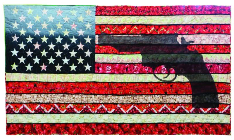 Michele Mackinen's quilt is part of the exhibition 'Guns: Loaded Conversations' at the San Jose Museum of Quilts and Textiles