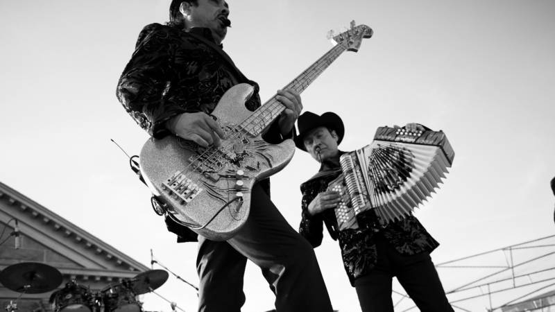 Hernán and Jorge Hernández from Los Tigres del Norte perform at Folsom State Prison.