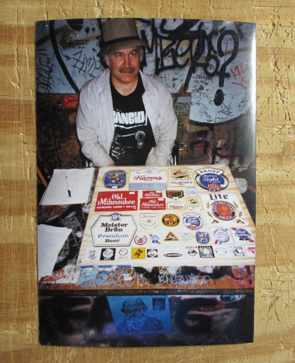 Steve Koepke selling patches and passing out The List at 924 Gilman.
