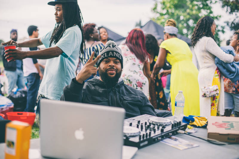 DJ Twelvz spins at Lake Merrit for "BBQ'n While Black," a celebration of African-American culture sparked by a white woman's widely lampooned police complaint.