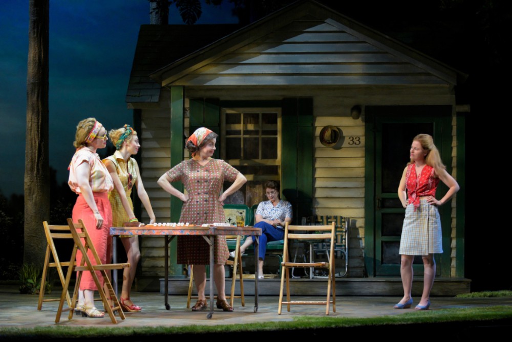 (L–R) Bunny (Molly Hager), Rhoda (Monique Hafen), Eleanor (Ariela Morgenstern), and Pearl (Katie Brayben) get together for an afternoon of mah-jongg in the world-premiere musical, 'A Walk on the Moon.' Background: Marty’s mother, Lillian (Kerry O’Malley).