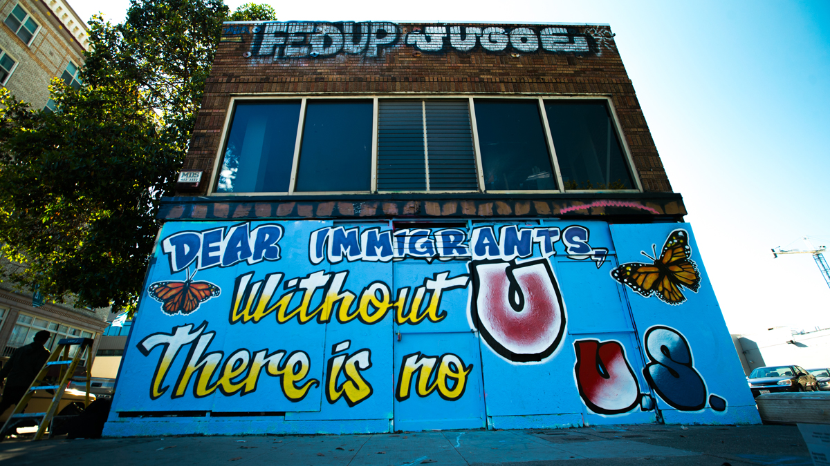 INDECLINE's 'Dear Immigrants' mural, June 2018.