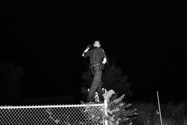 Paolo Pellegrin, 'A police officer. Northeast Rochester, NY,' 2013.