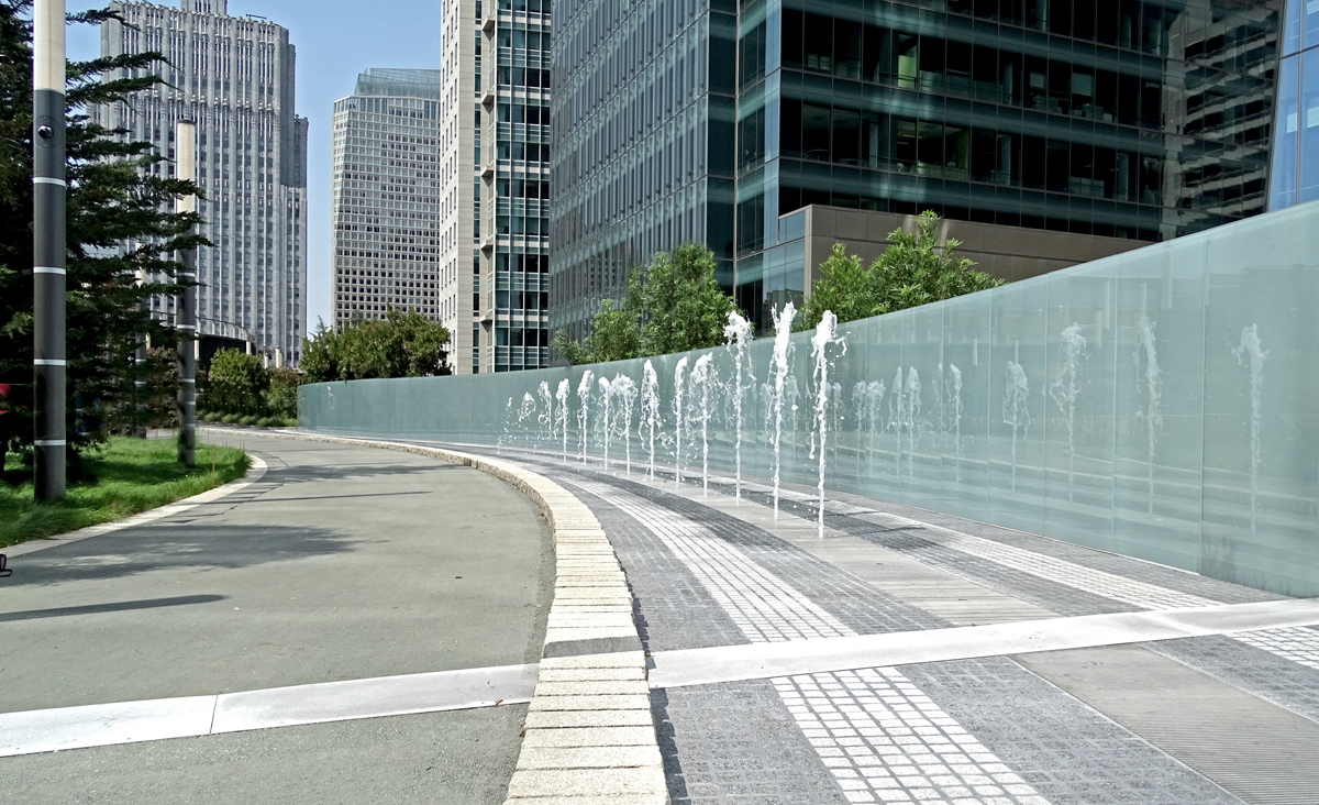 Ned Kahn's 'Bus Jet Fountain' in action, representing the movement of an AC Transit bus on the floor below the park.