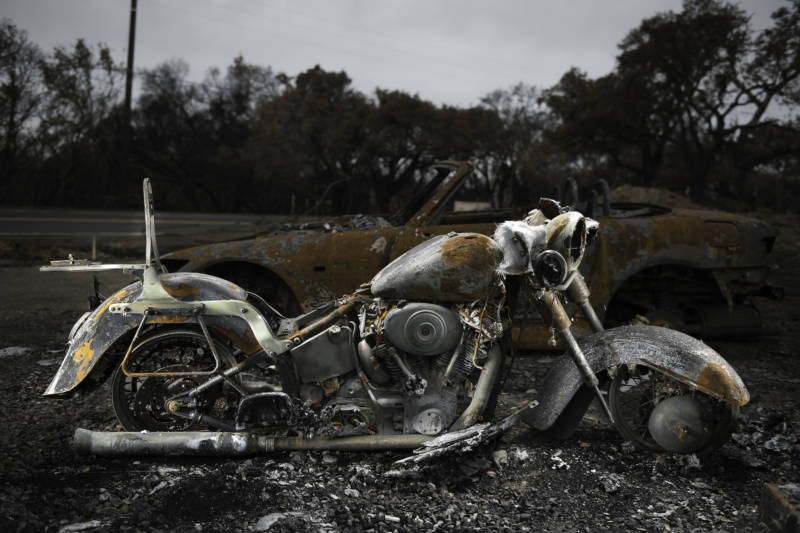 The wreckage from a burnt out vintage Harley Davidson encapsulates what was lost in the Wine Country wildfires of 2017.