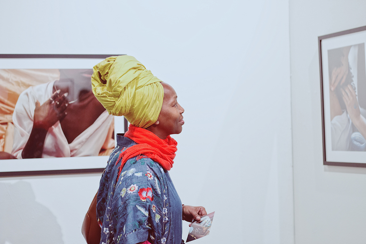 A gallery visitor during the opening of Kierra Johnson's photography exhibition 'Signify' at Betti Ono.