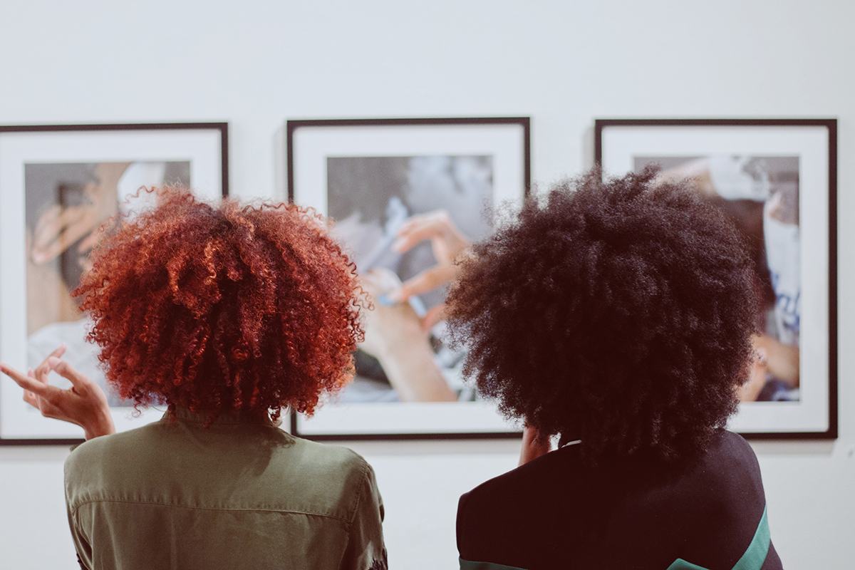 Gallery visitors during the opening of Kierra Johnson's photography exhibition 'Signify' at Betti Ono.