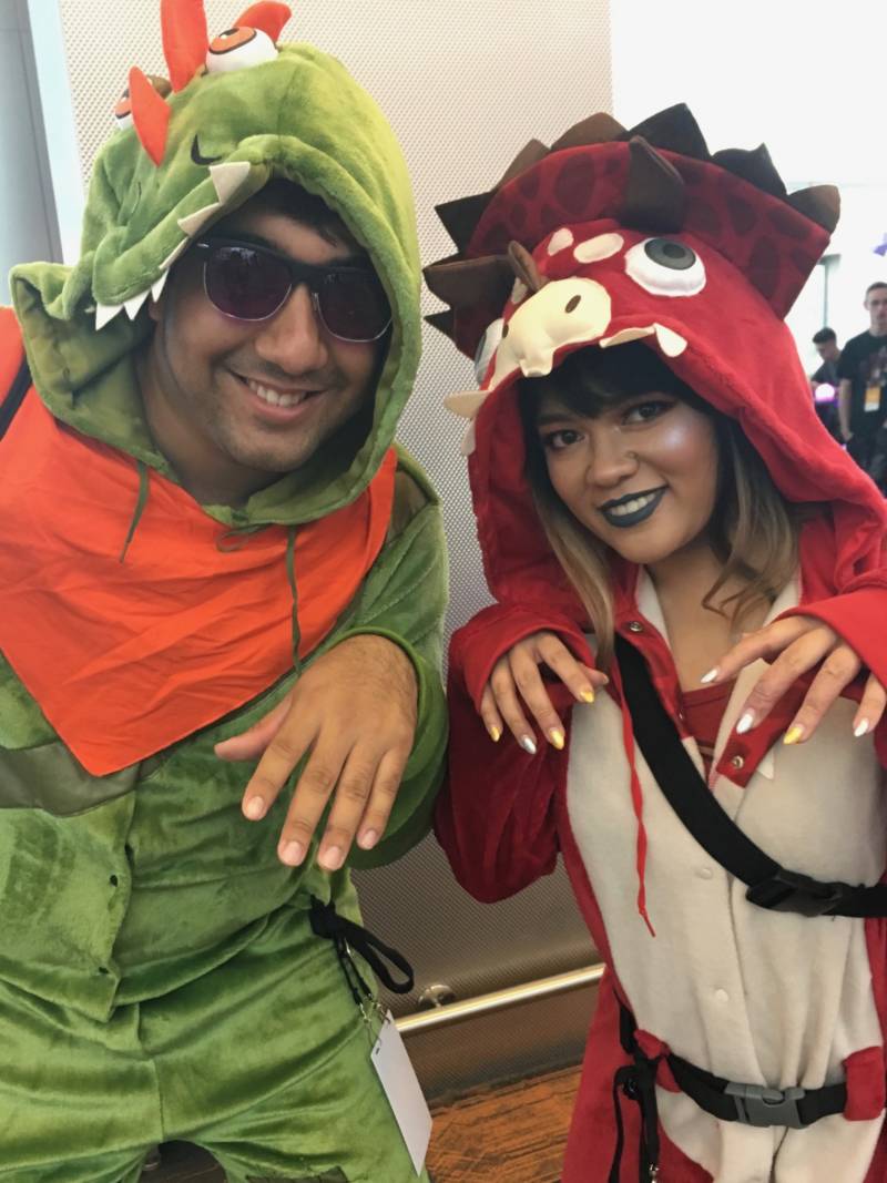 Anthony Garcia and Alma Grace of Las Vegas dressed as "skins" from the game Fortnite: specifically, trex and triceratops. “It’s really fun. Every year, it grows," says Garcia. "Just seeing all these other streamers and the community, it’s awesome.” 