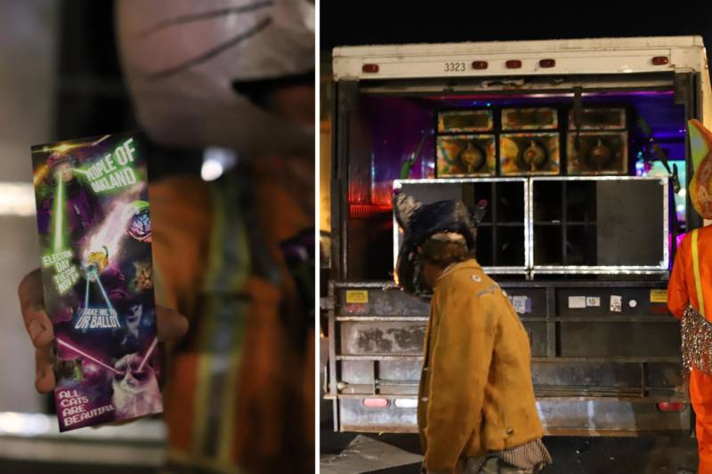 The Oakland Guild of Space Cat Voters passes out rave-style handbill flyers and plays music from a bank of speakers in their large remodeled bread truck.