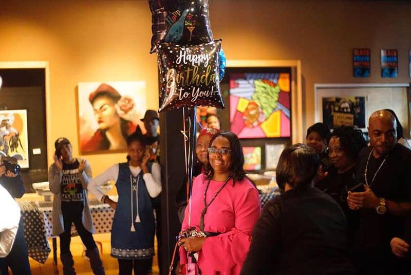 Wanda Johnson (center), mother of Oscar Grant, at a December 2018 event at Eastside Arts Alliance in Oakland.
